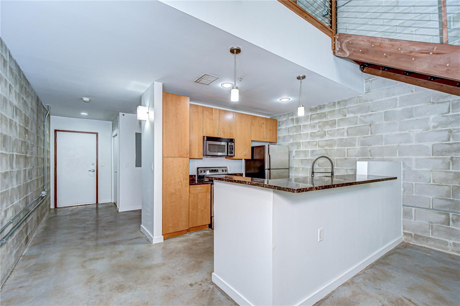 The kitchen is sleek and functional!