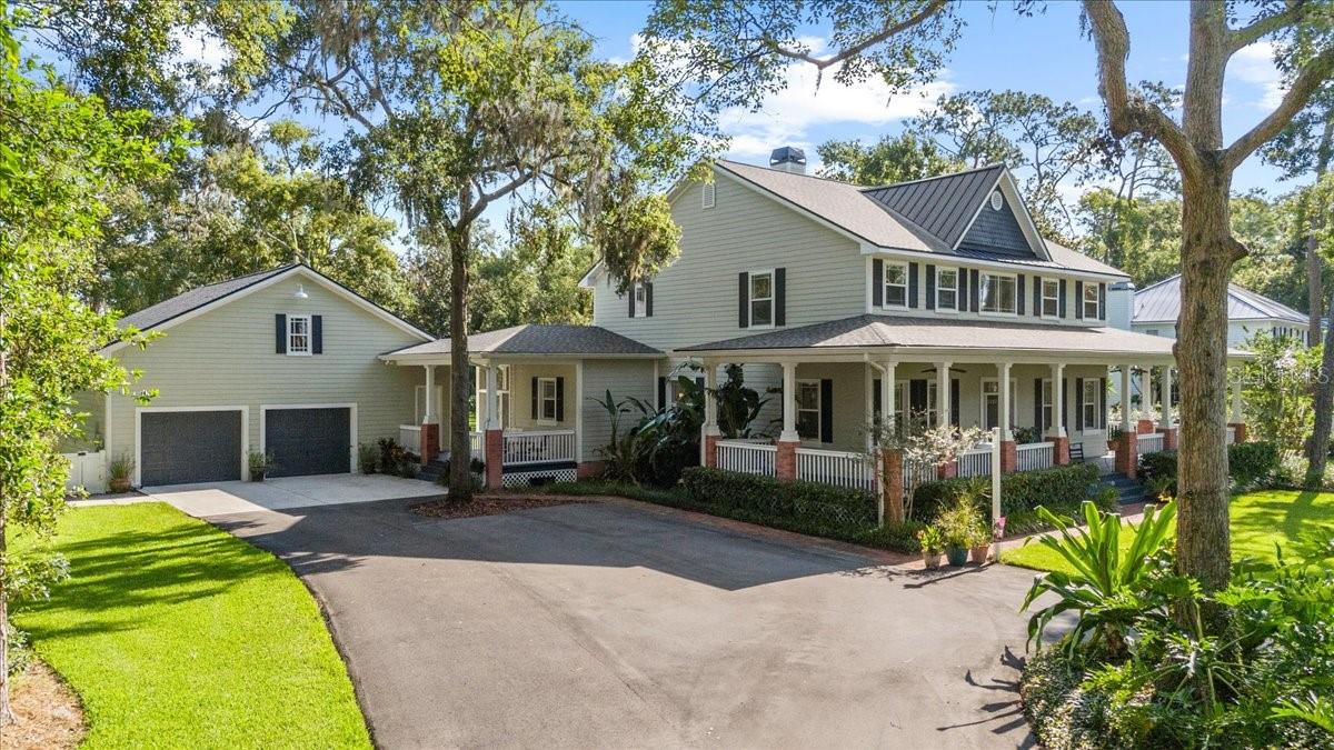 Detached garage with walkway to house