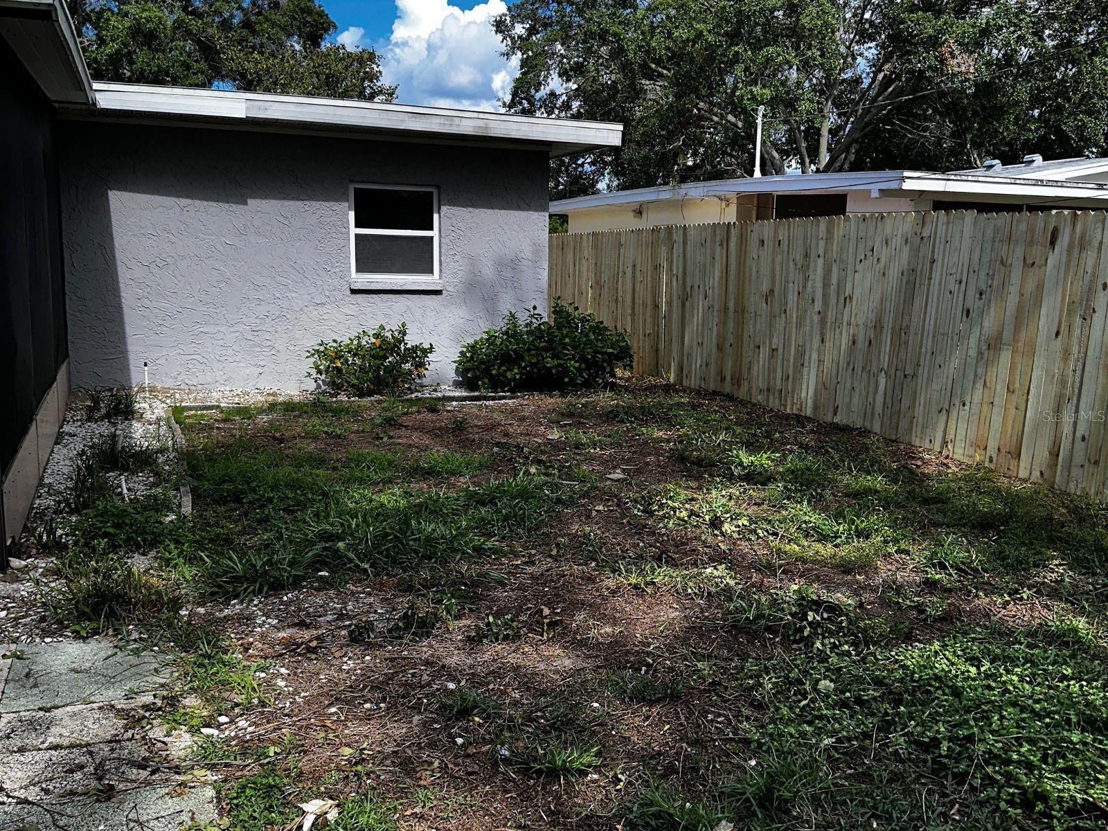 back yard with fencing new