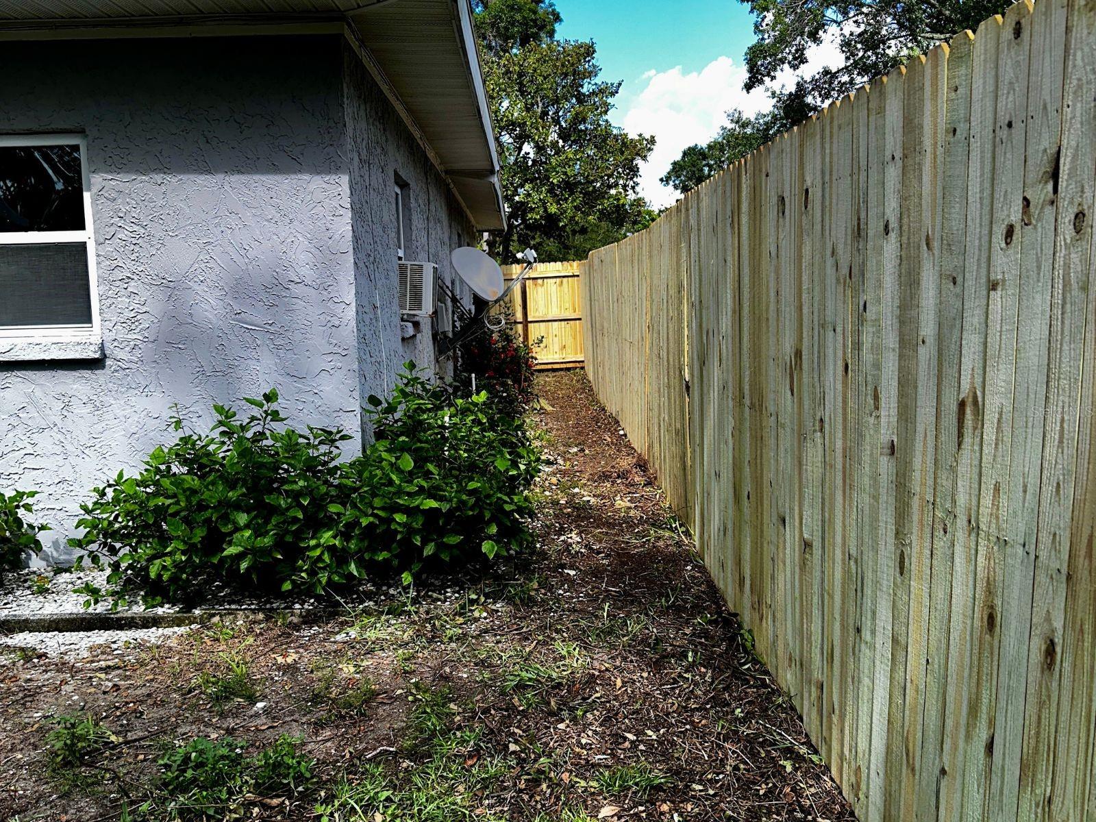 side yard with new fence