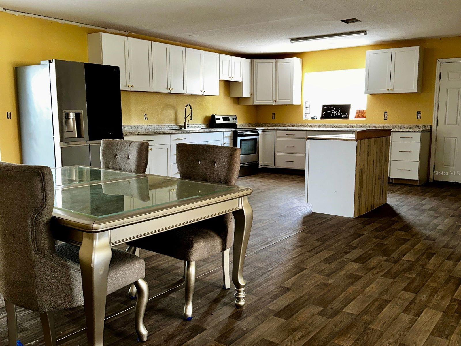 huge kitchen with eat in space