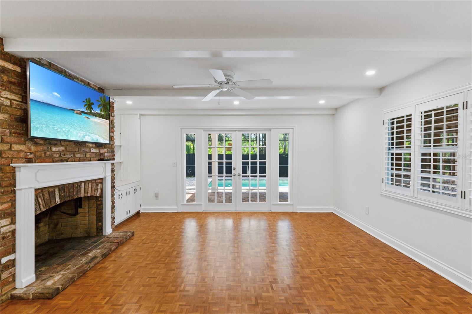 Living room overlooking pool
