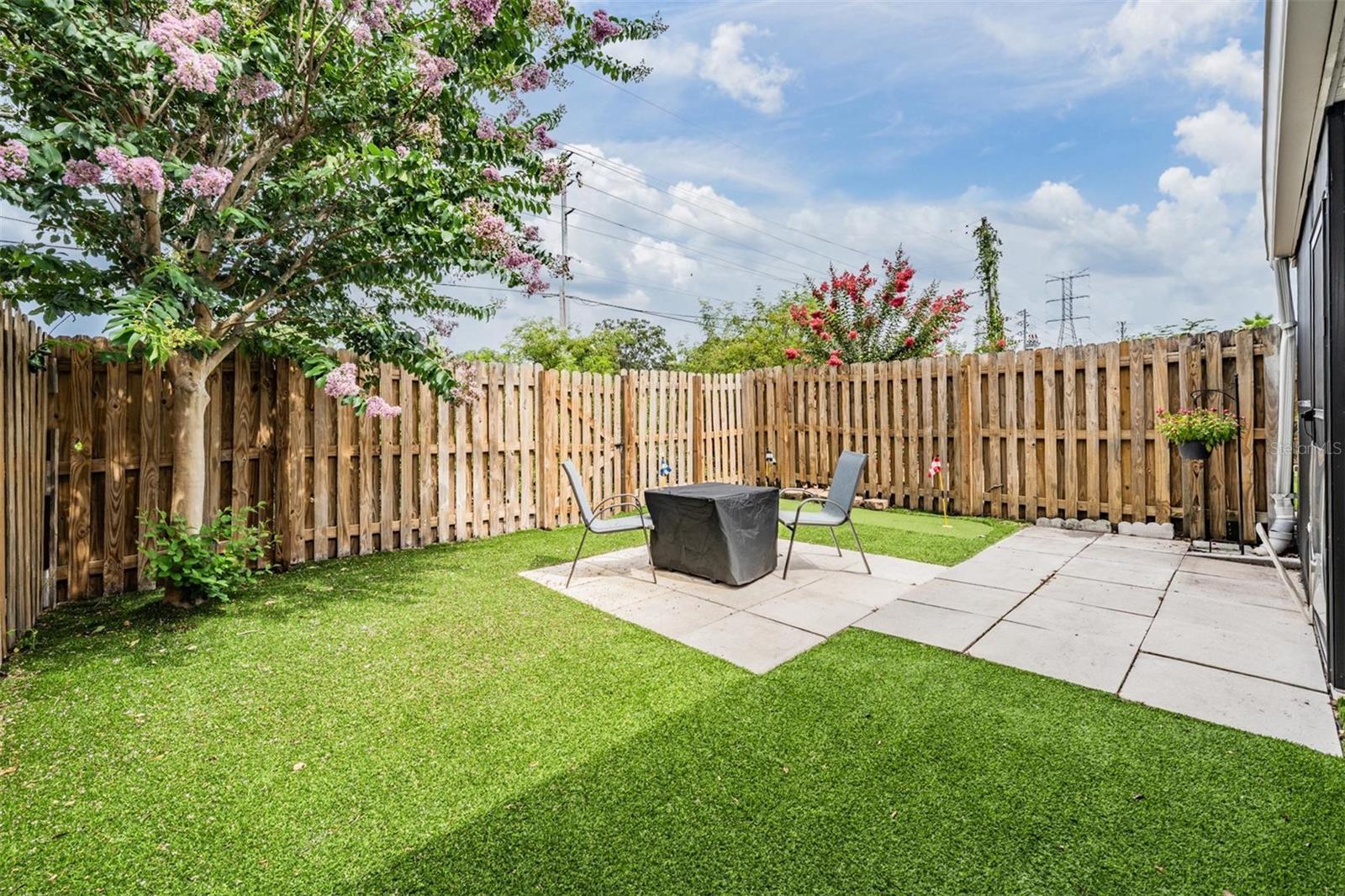 Fully turf backyard for little to no maintenance!