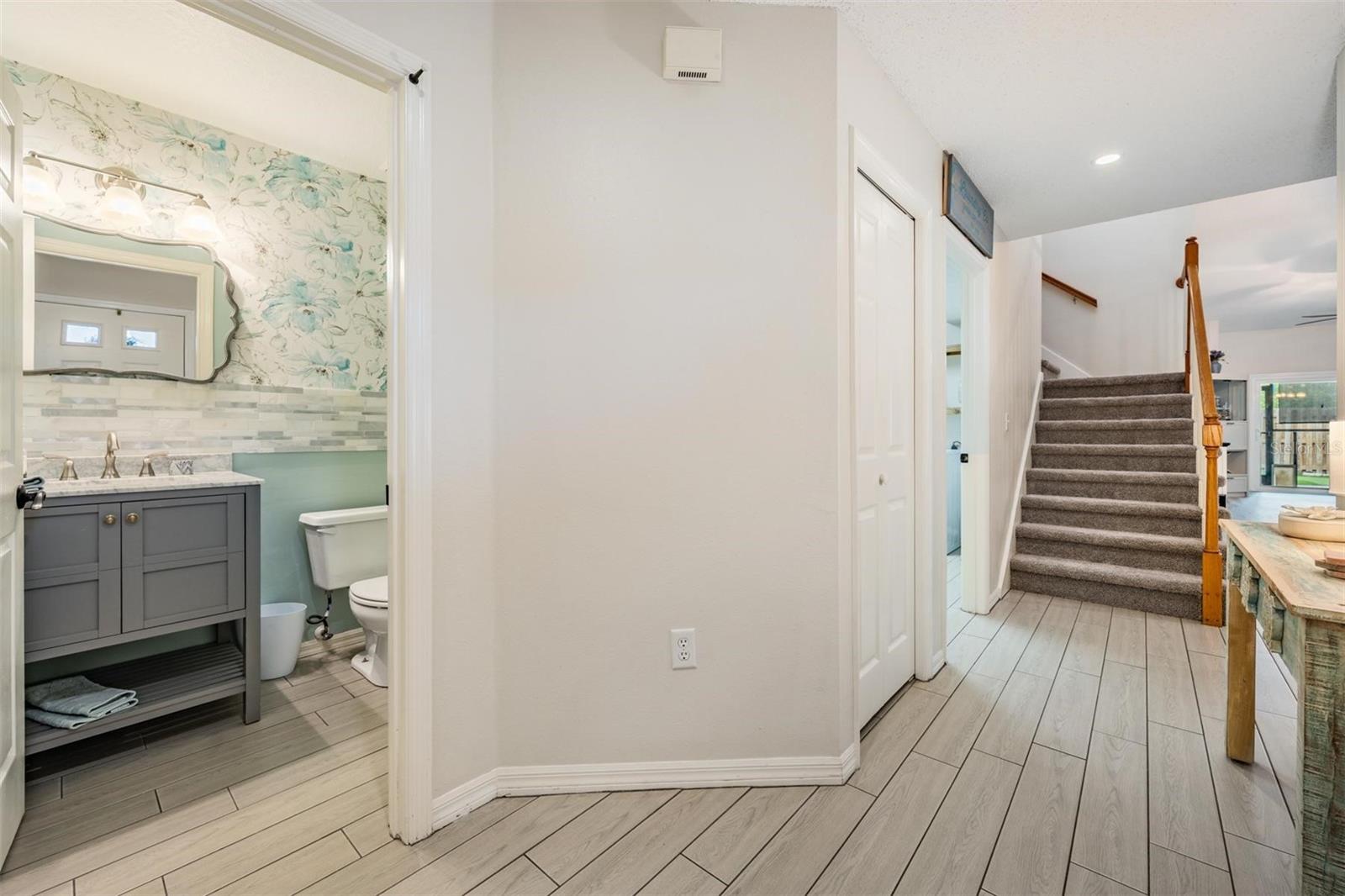 Entryway with half bath