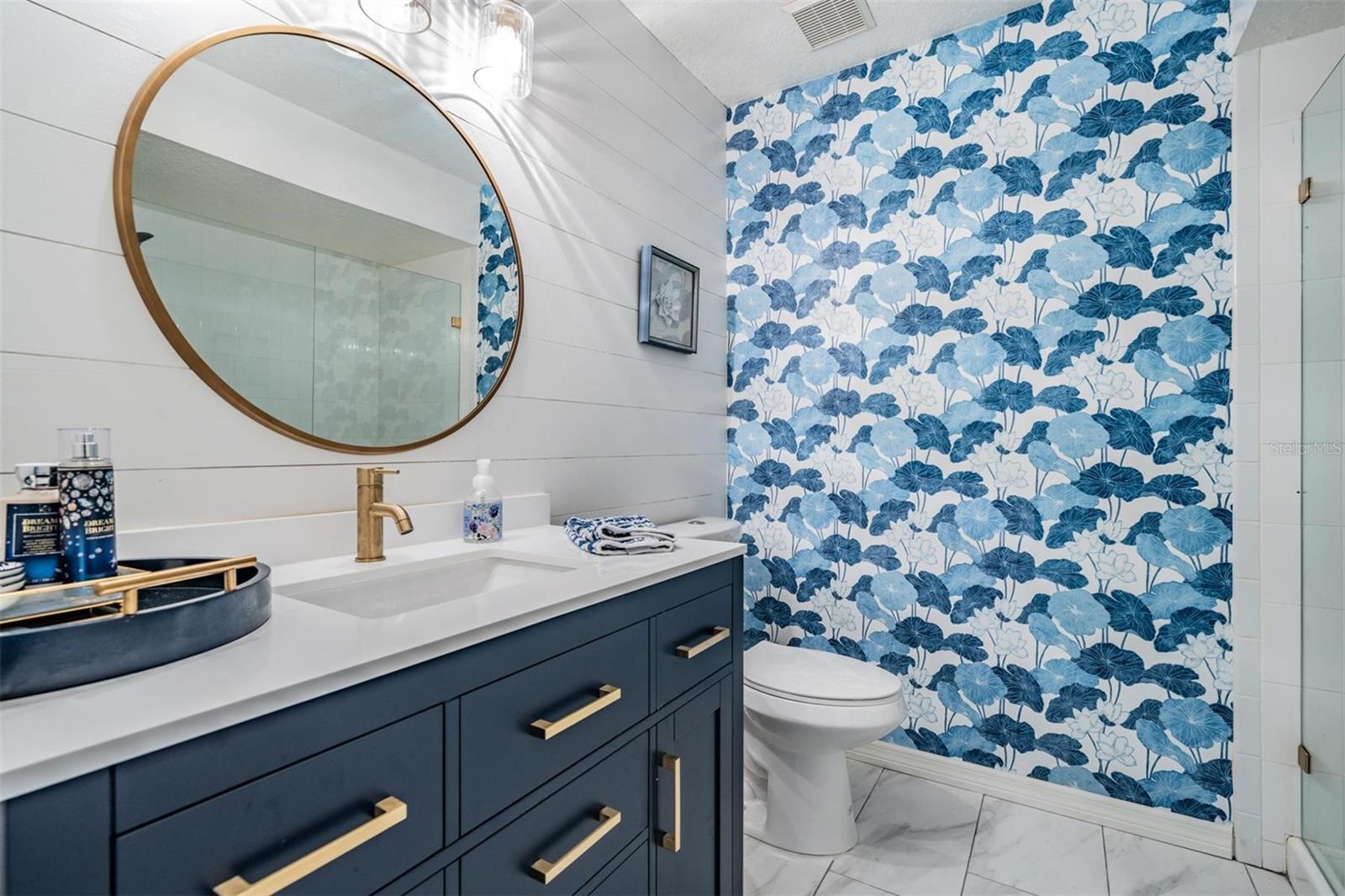 Bath 2, second floor, remodeled, walk-in shower with frameless glassdoor