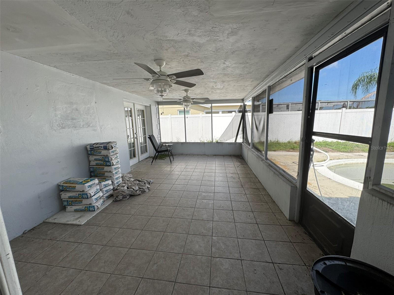 covered and screened in back porch