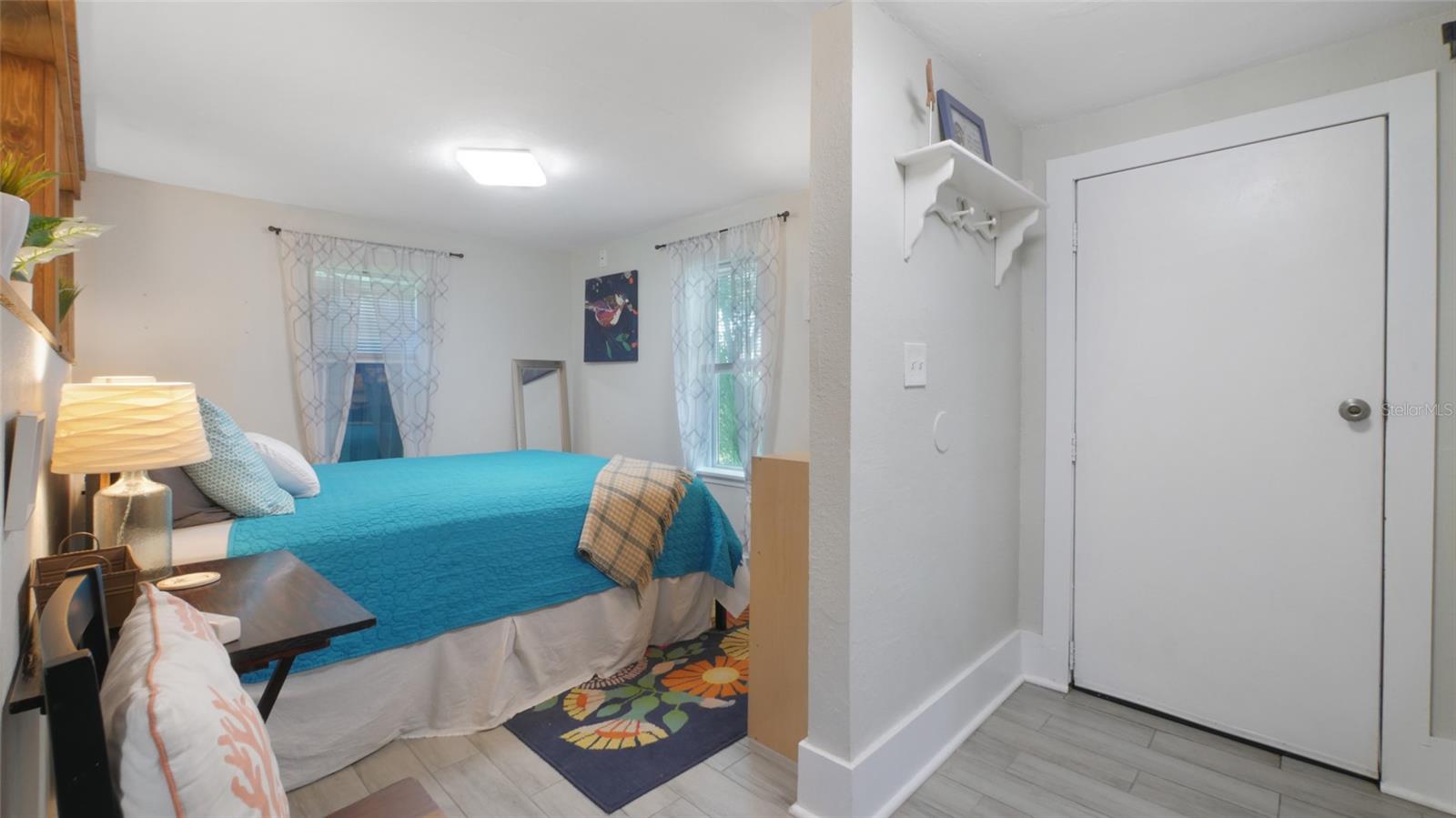 Bedroom, backdoor and bathroom to the right
