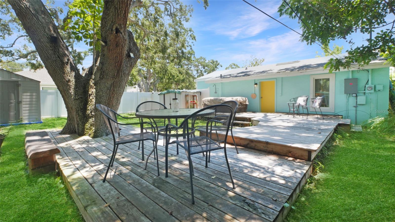 Spacious backyard with deck