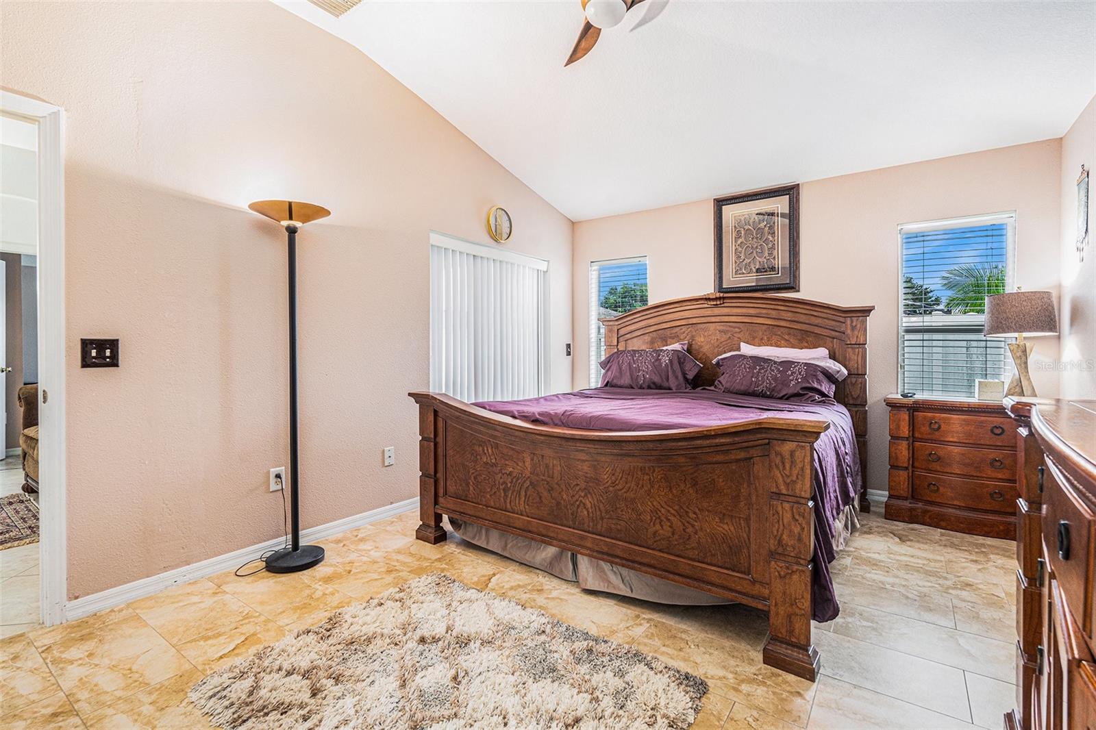 Primary bedroom suite with backyard access