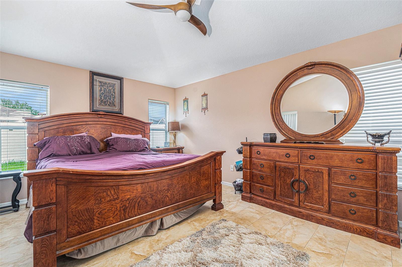 Primary bedroom suite with backyard access