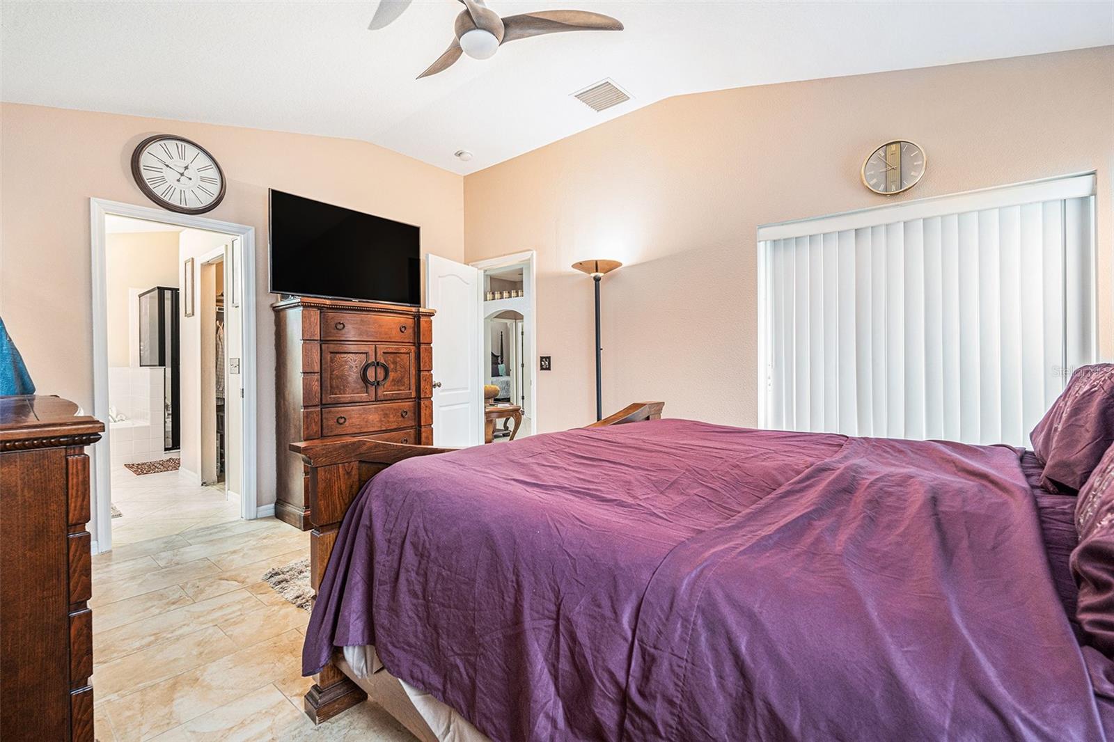 Primary bedroom suite with backyard access