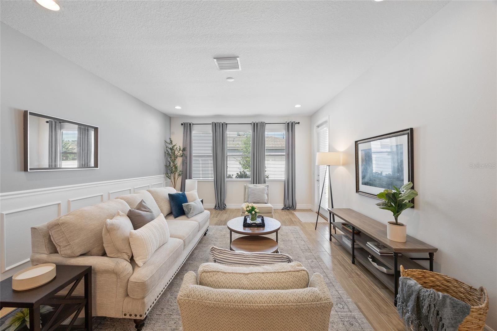 Living room with access to backyard