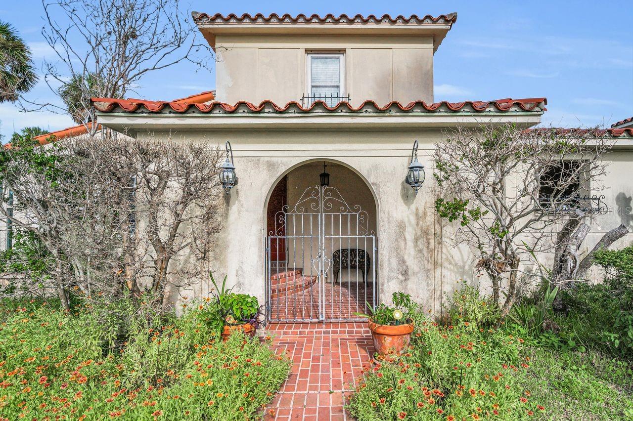 A regal front entrance for a once stately home!