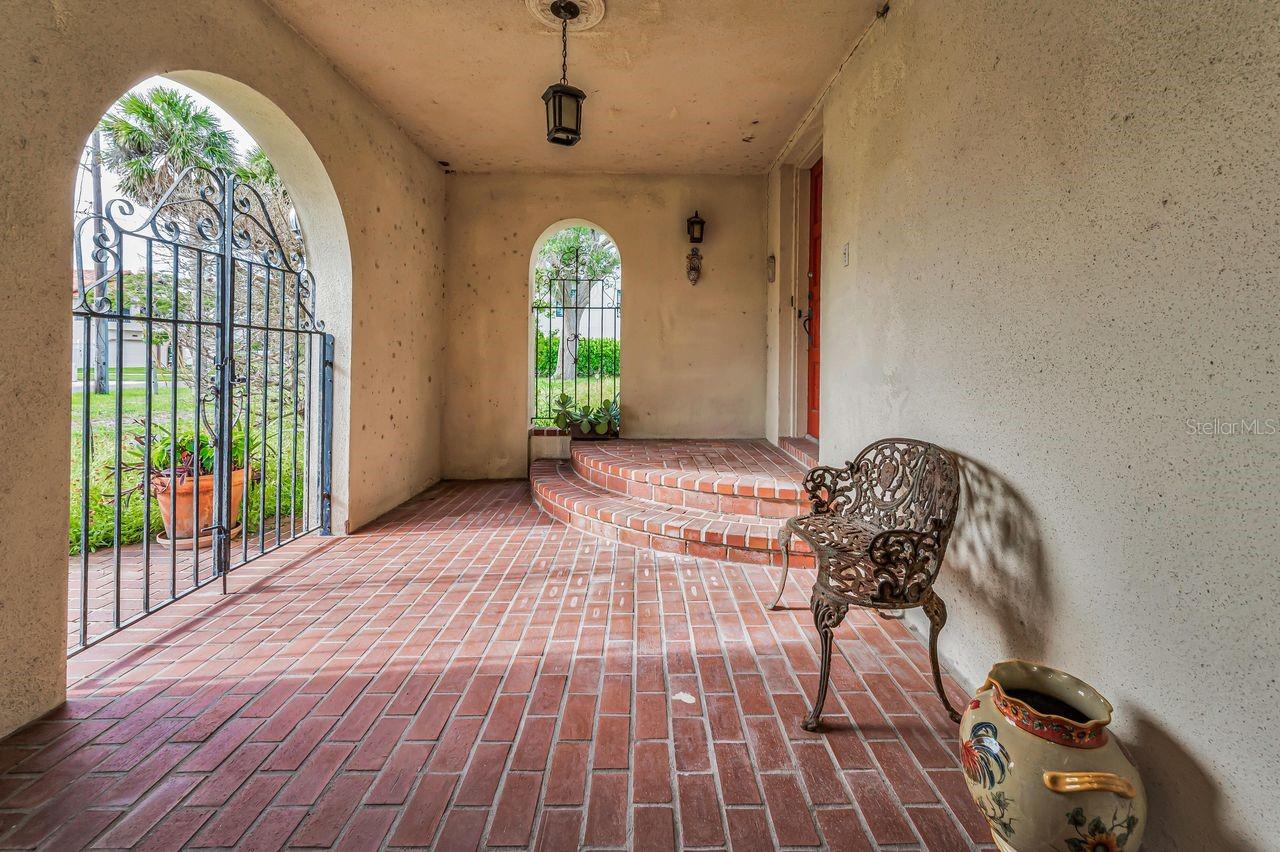 An amazing outdoor foyer to welcome family and friends.