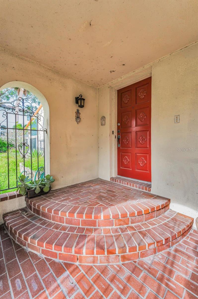 The incredible brickwork and other architectural details in this home are just asking to be restored!