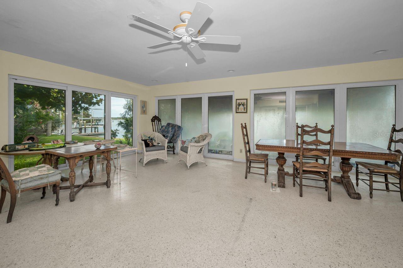 This rather large family room takes in the entire view of the 180' of seawall!