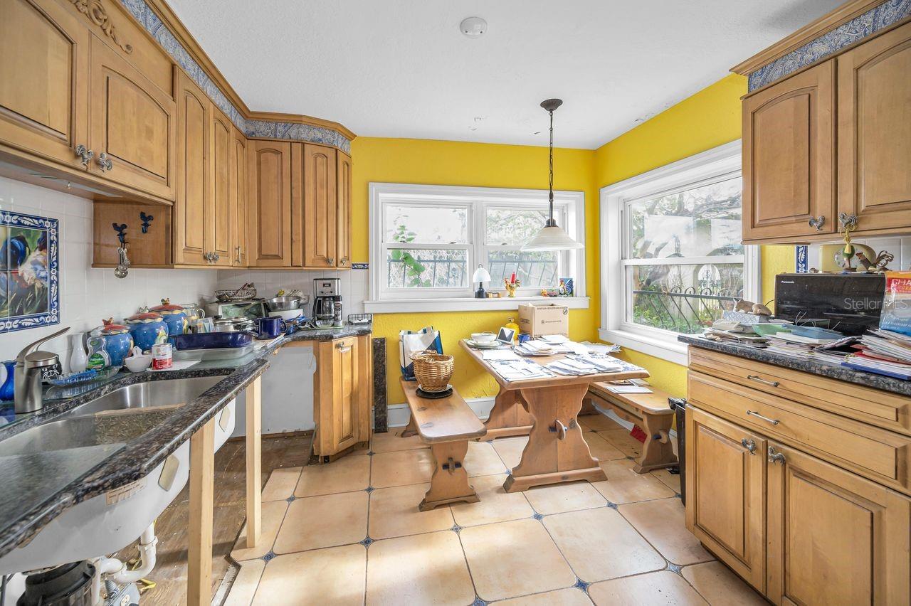 Room enough for a full size table and benches in this eat-in kitchen.