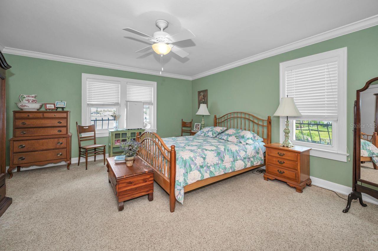 Second floor bedroom with water views.