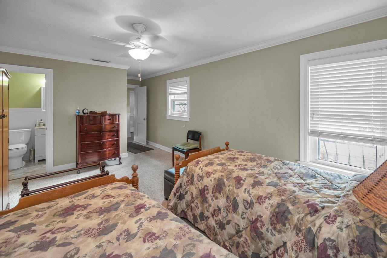This bedroom offers its own private bathroom.