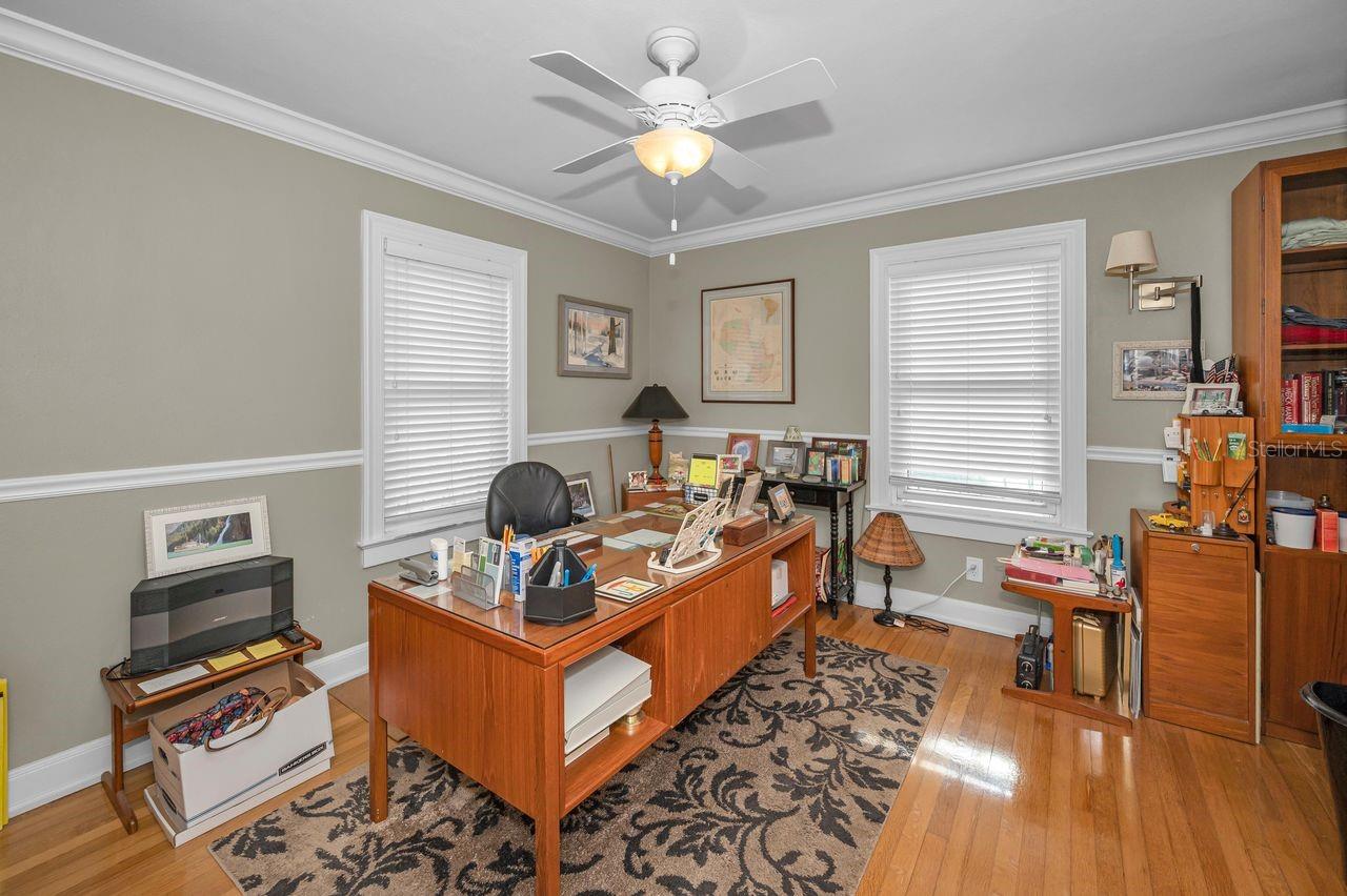 Currently used as a home office, this space could also function as an additional bedroom.