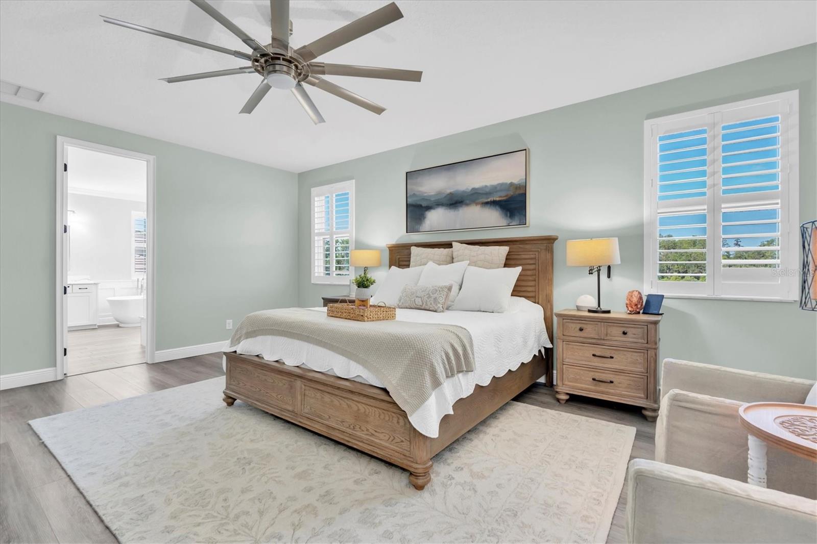 PRIMARY BEDROOM WITH A VIEW