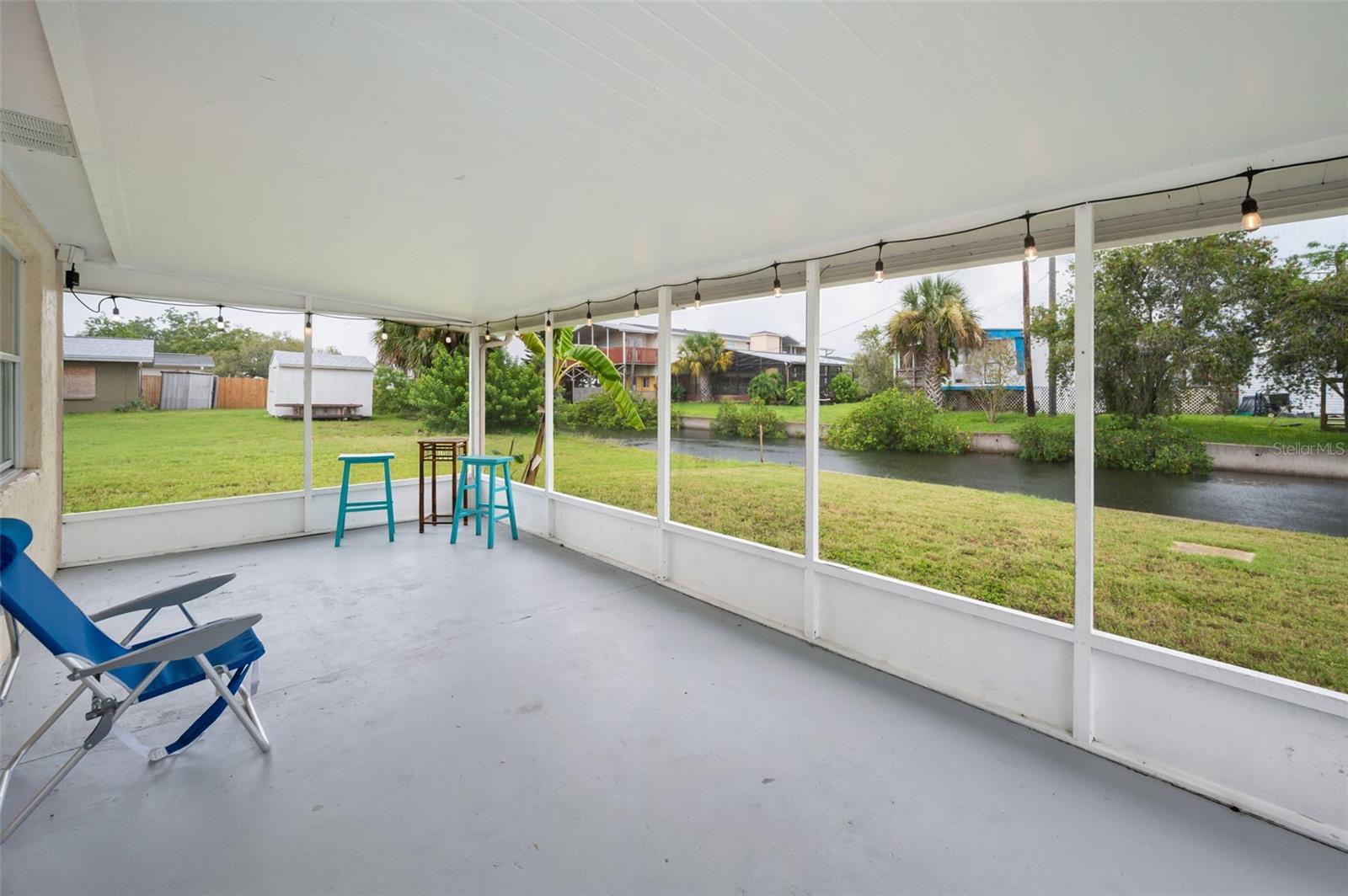 REAR SCREENED PORCH