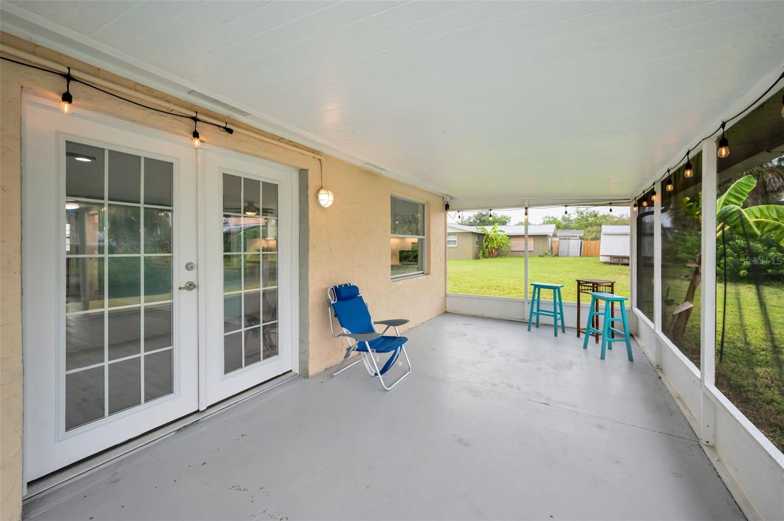 REAR SCREENED PORCH
