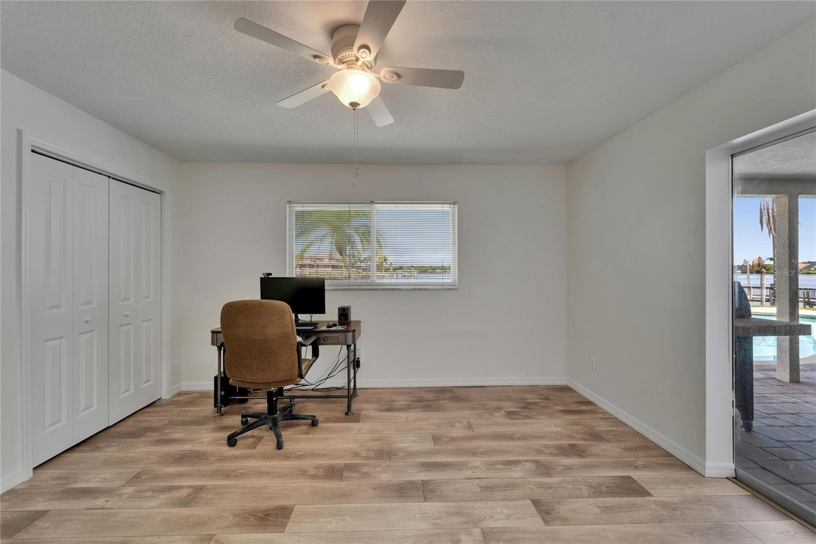 Large 2nd Bedroom overlooks lanai and water