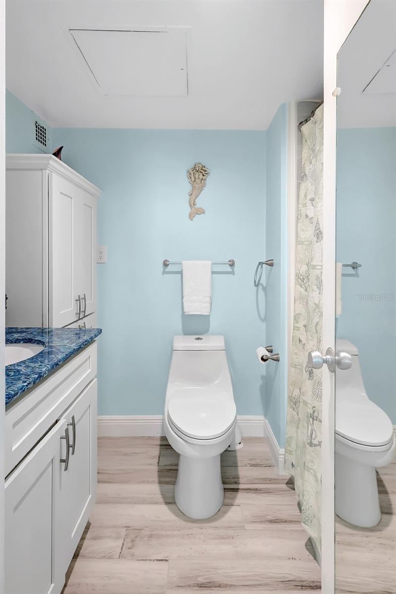 The secondary bath, is ubdated and has a tub/shower combo