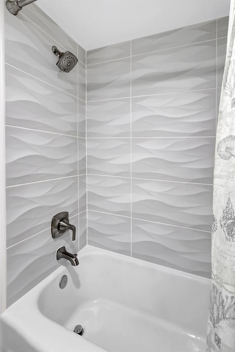 The tub is beautifully tiled