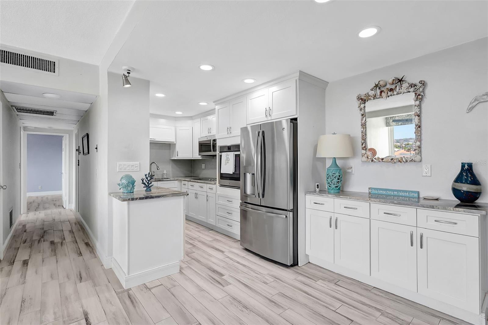 Enjoy cooking in your updated kitchen with plenty of storage.