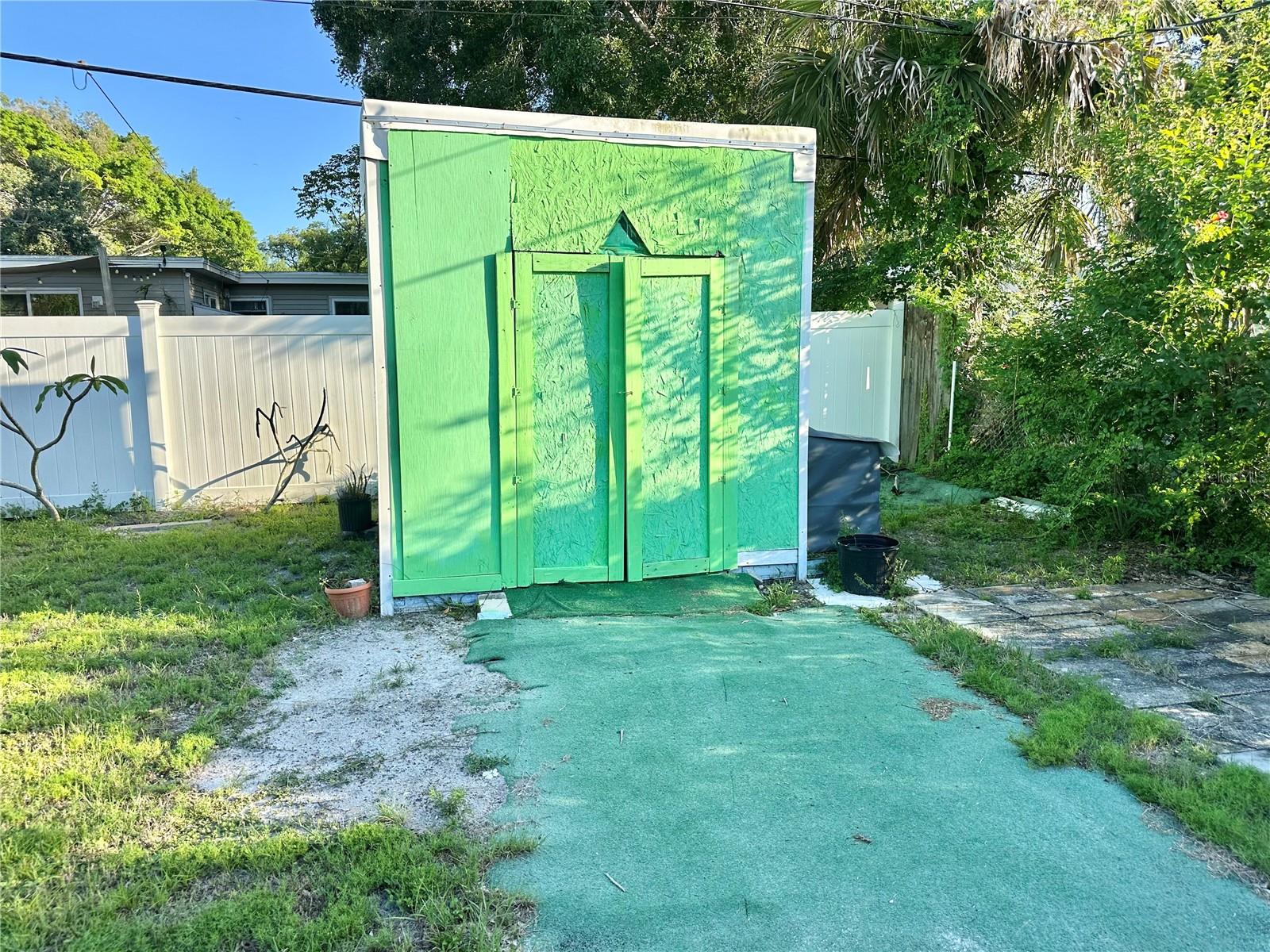 Shed with Lawnmower