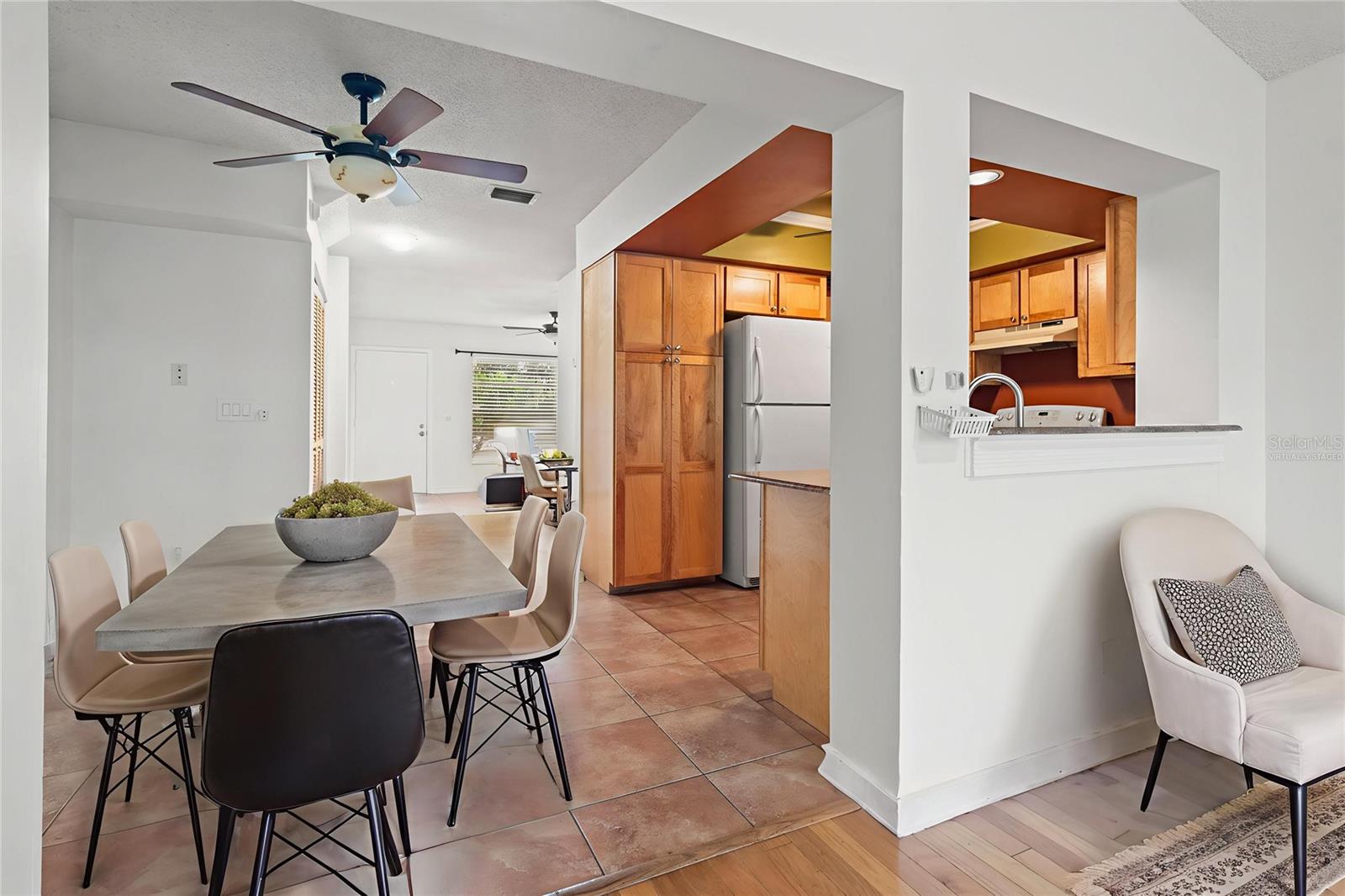 Virtually Staged Dining Room right off the kitchen