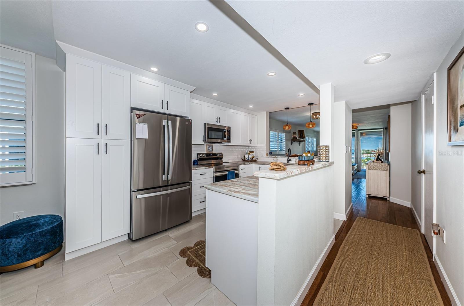 newly remodeled kitchen with marble countertops