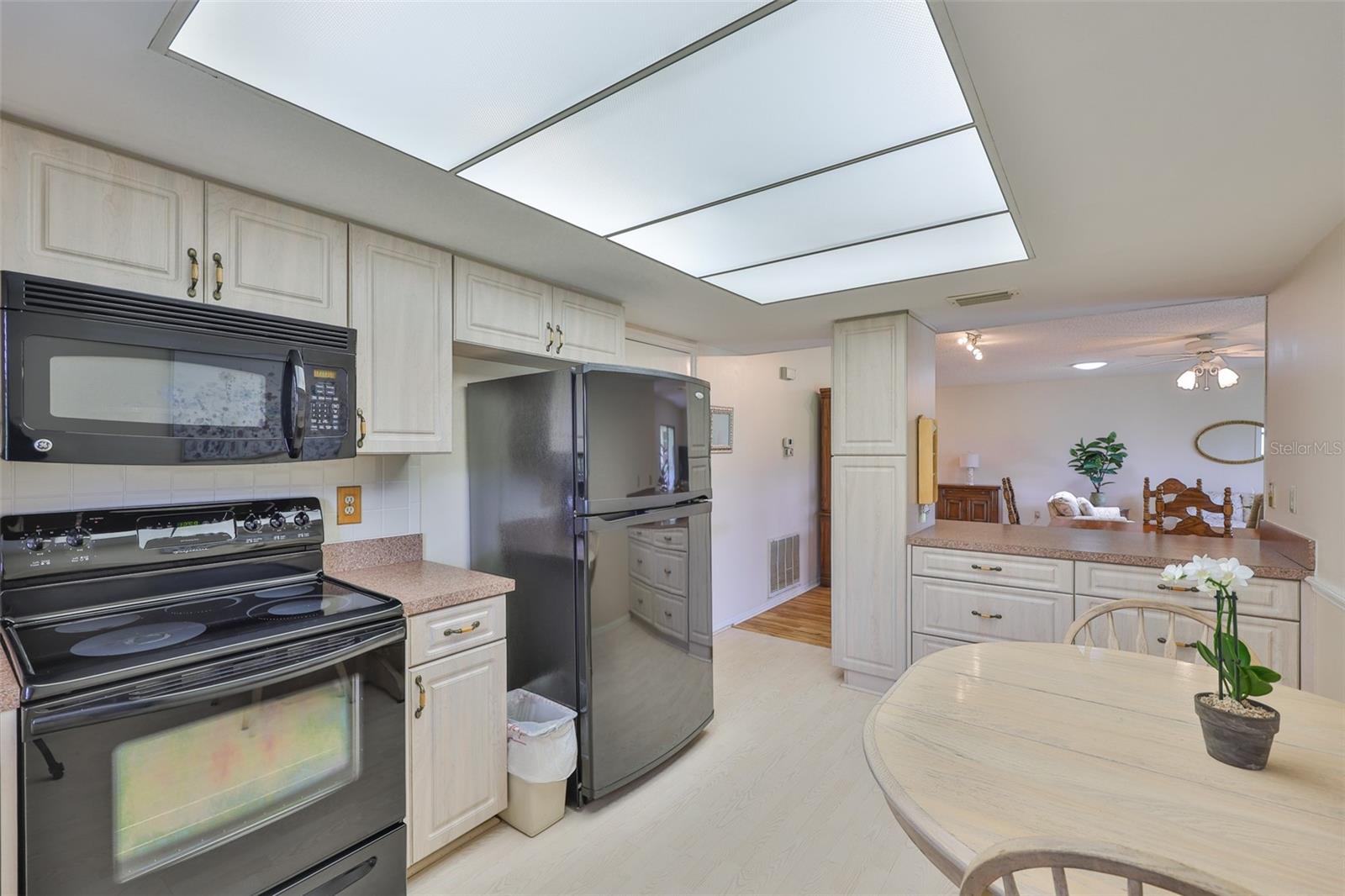 Matching appliances compliment the kitchen.