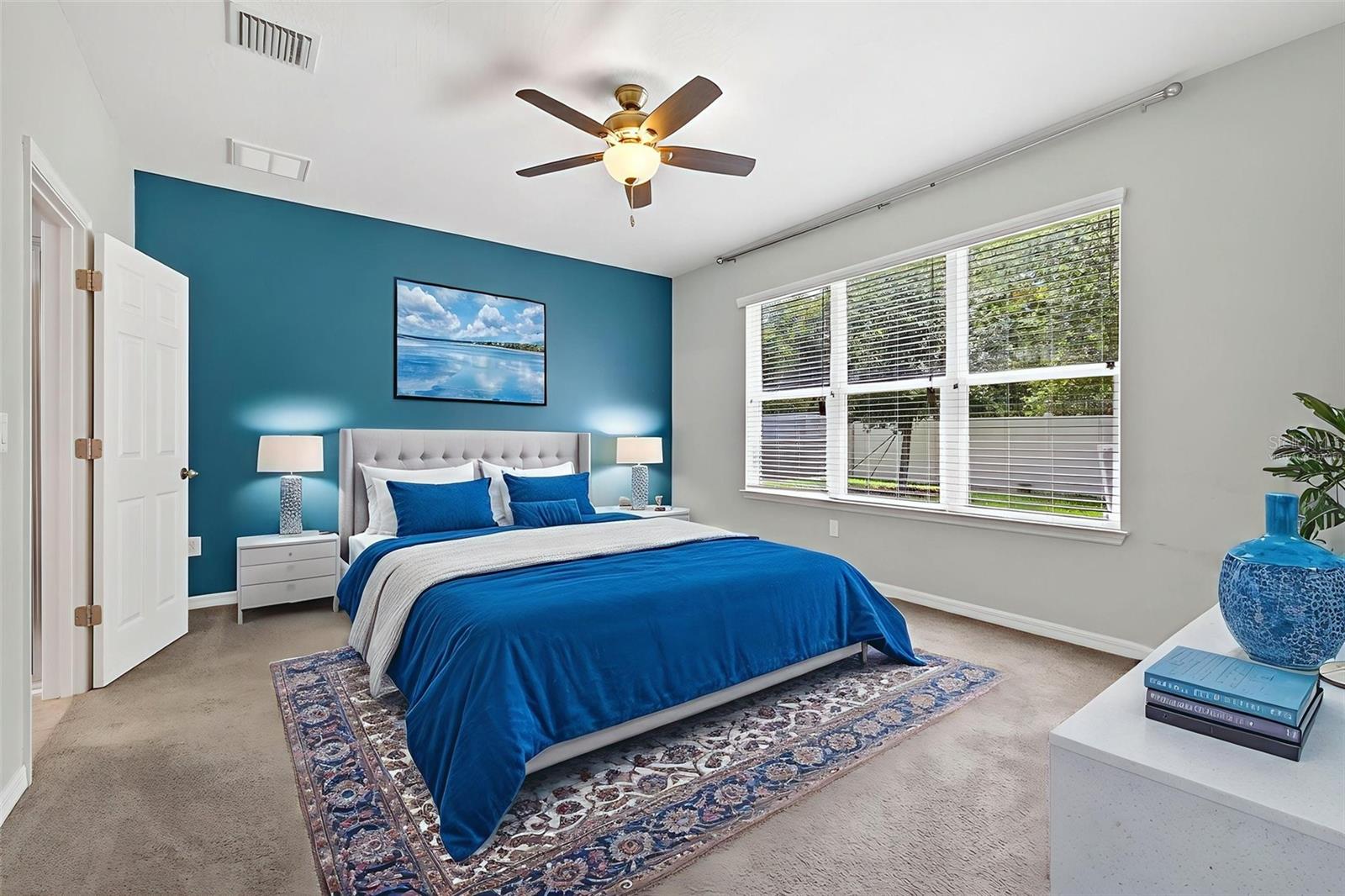 Primary bedroom virtually staged photo