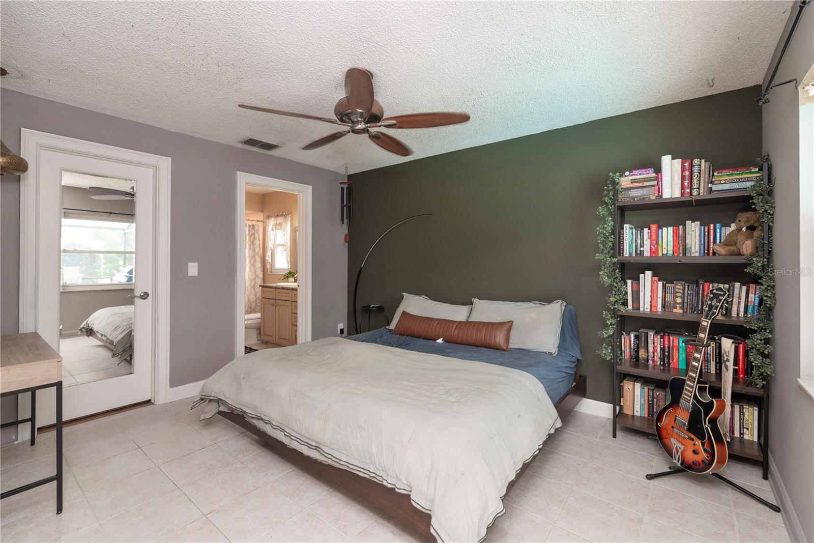 Primary bedroom with walk-in closet and en-suite bath.