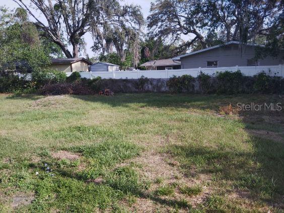 Expansive backyard, perfect for play, pets, and entertaining.