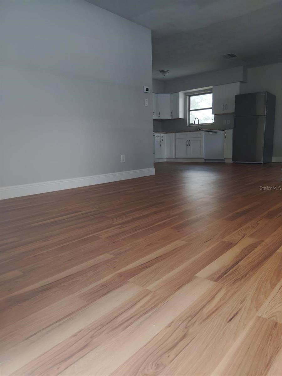 Premium luxury vinyl flooring seamlessly flows throughout the entire home.