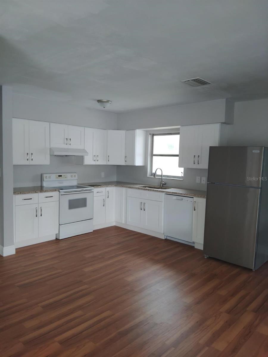 Updated kitchen perfect for cooking and entertaining.