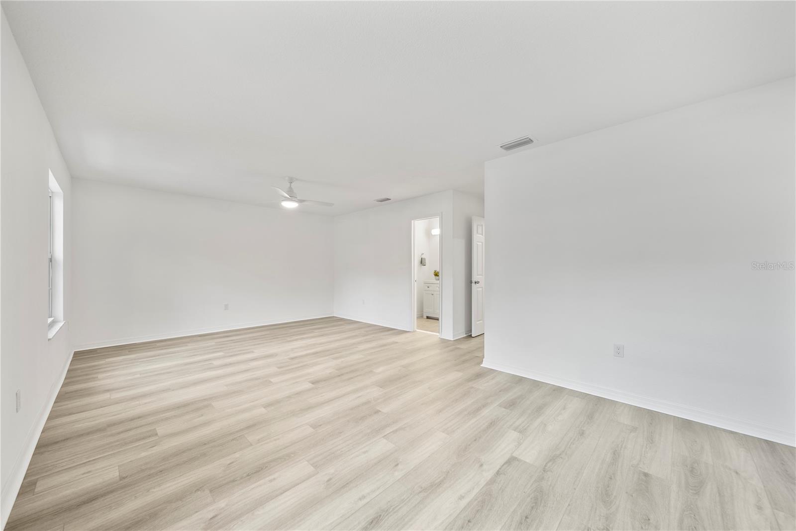 Brand New Luxury Plank Vinyl, Baseboards completely redone!
