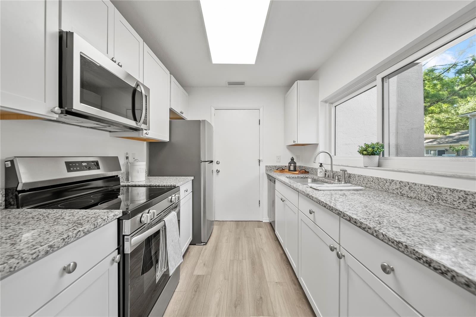 White Kitchen/Granite Counters & Brand New Stainless Steel Appliances