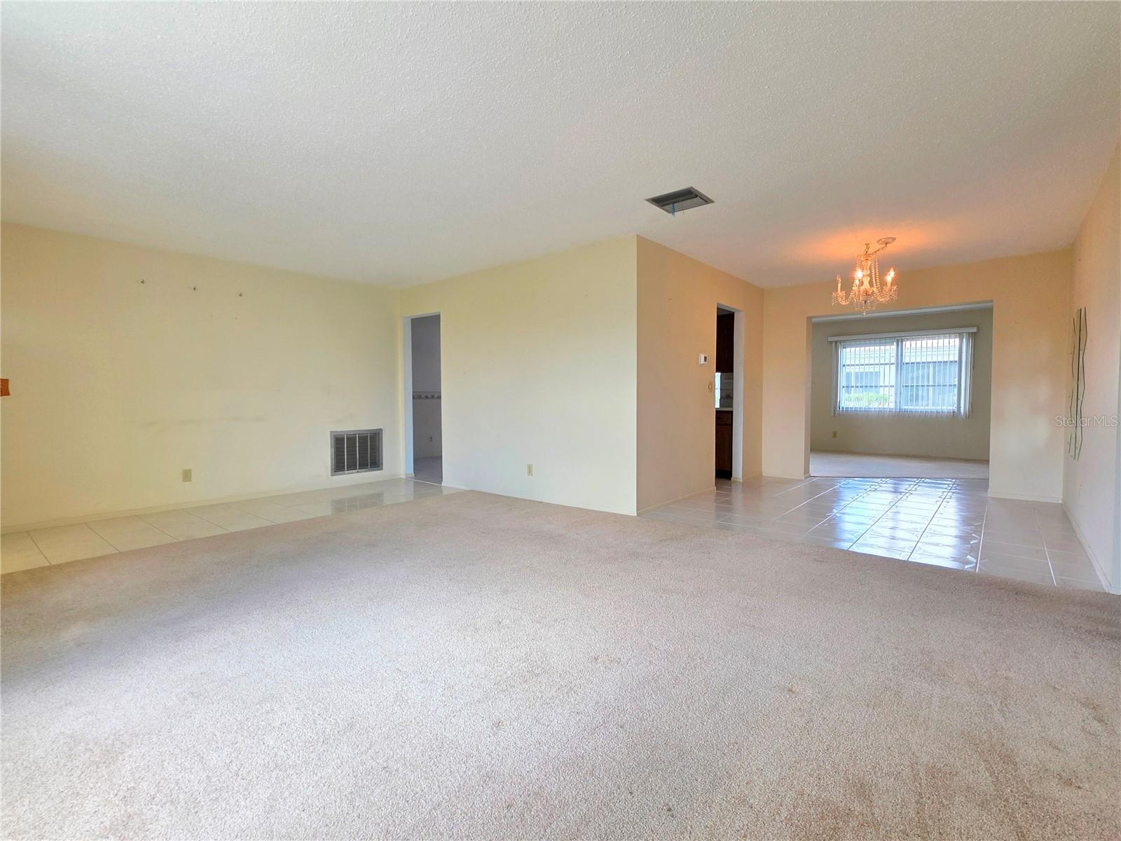 Living room that flows into rest of home