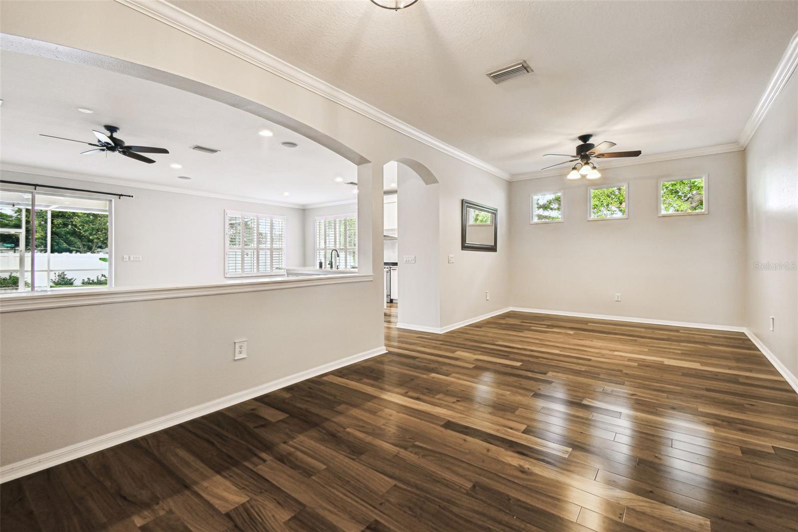 View of Formal rooms looking into family room and Kitchen