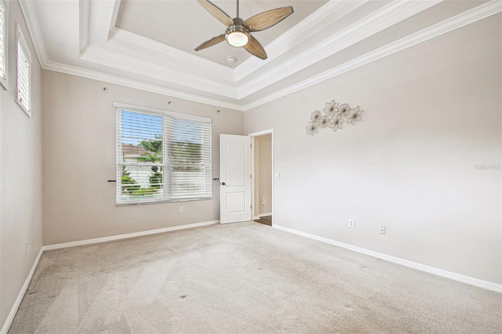 Primary with window to backyard