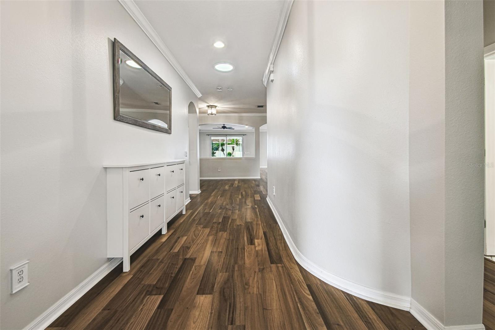 Foyer w/ Gleaming Hardwood Floors