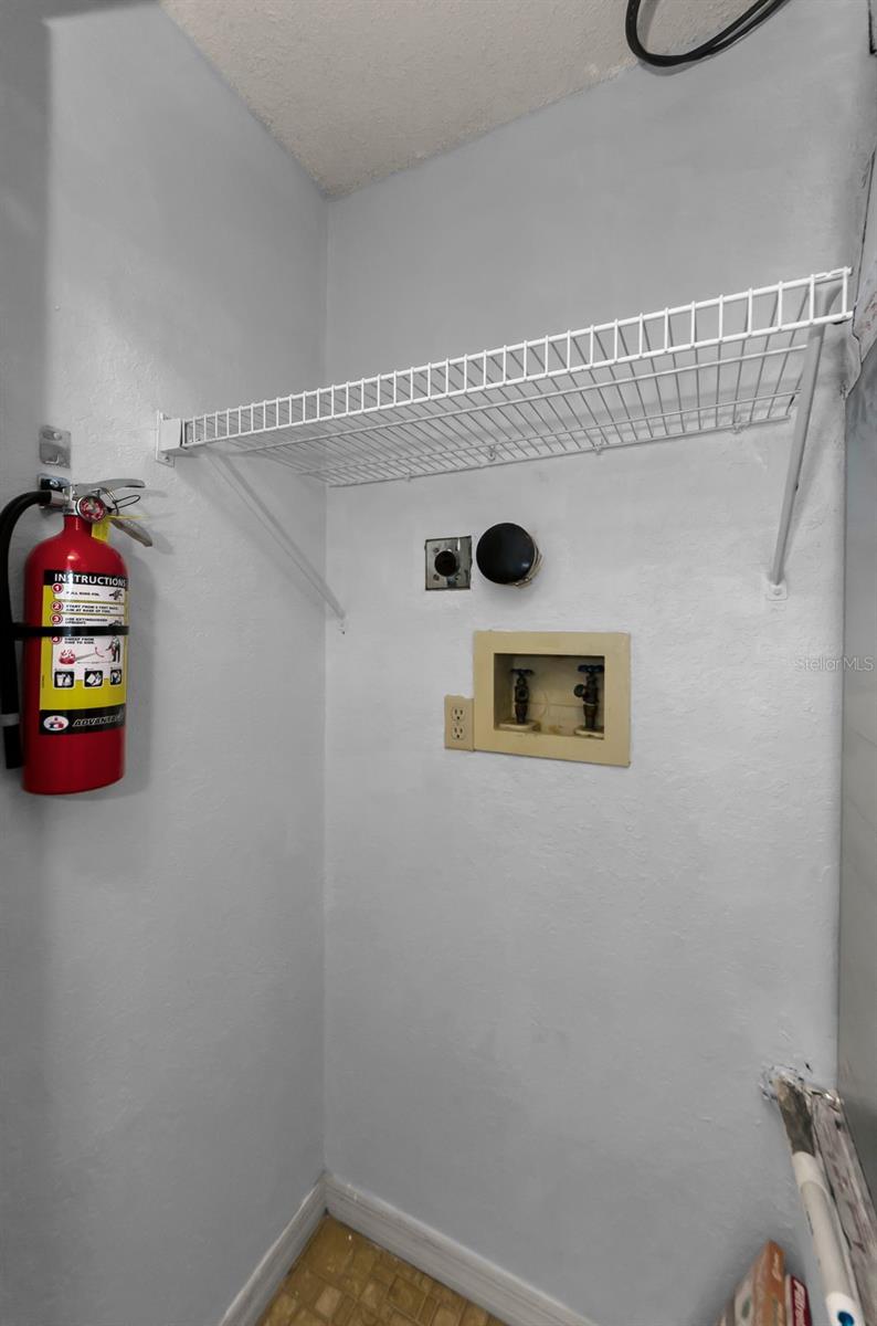 Laundry hook ups inside the hall closet.