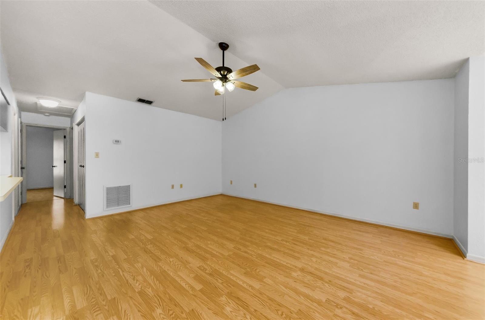 Open and spacious living room with vaulted ceilings.