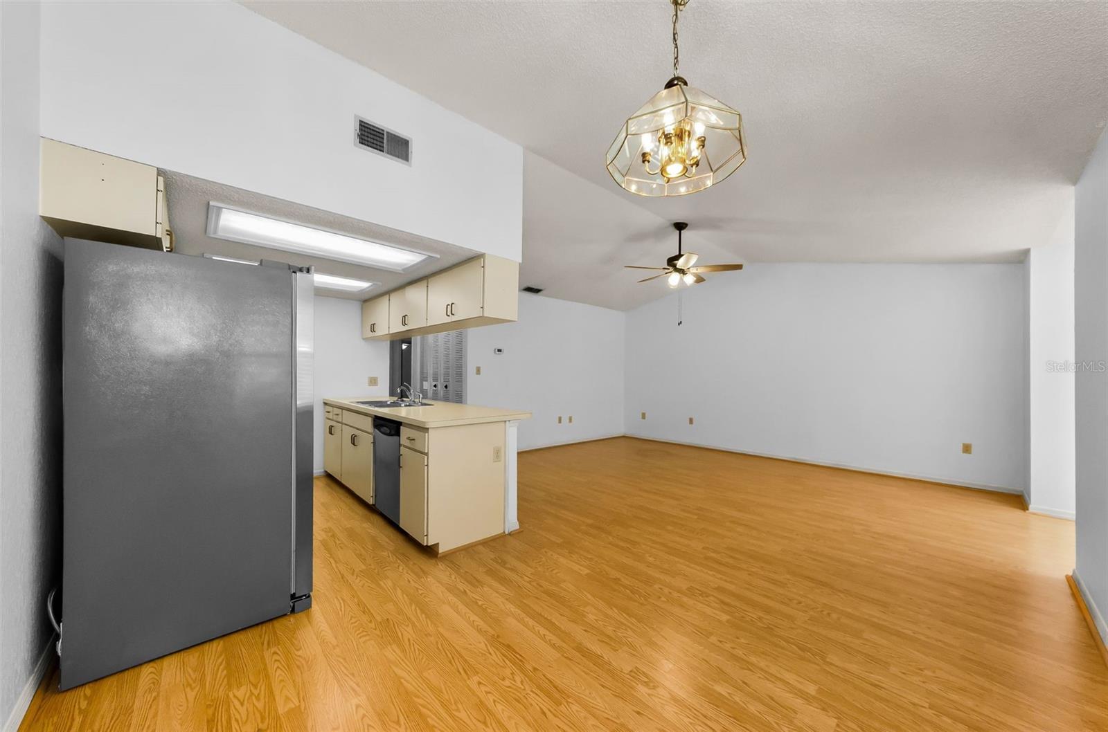Slide up to the eat in kitchen bar or sprawl out in the dining room.