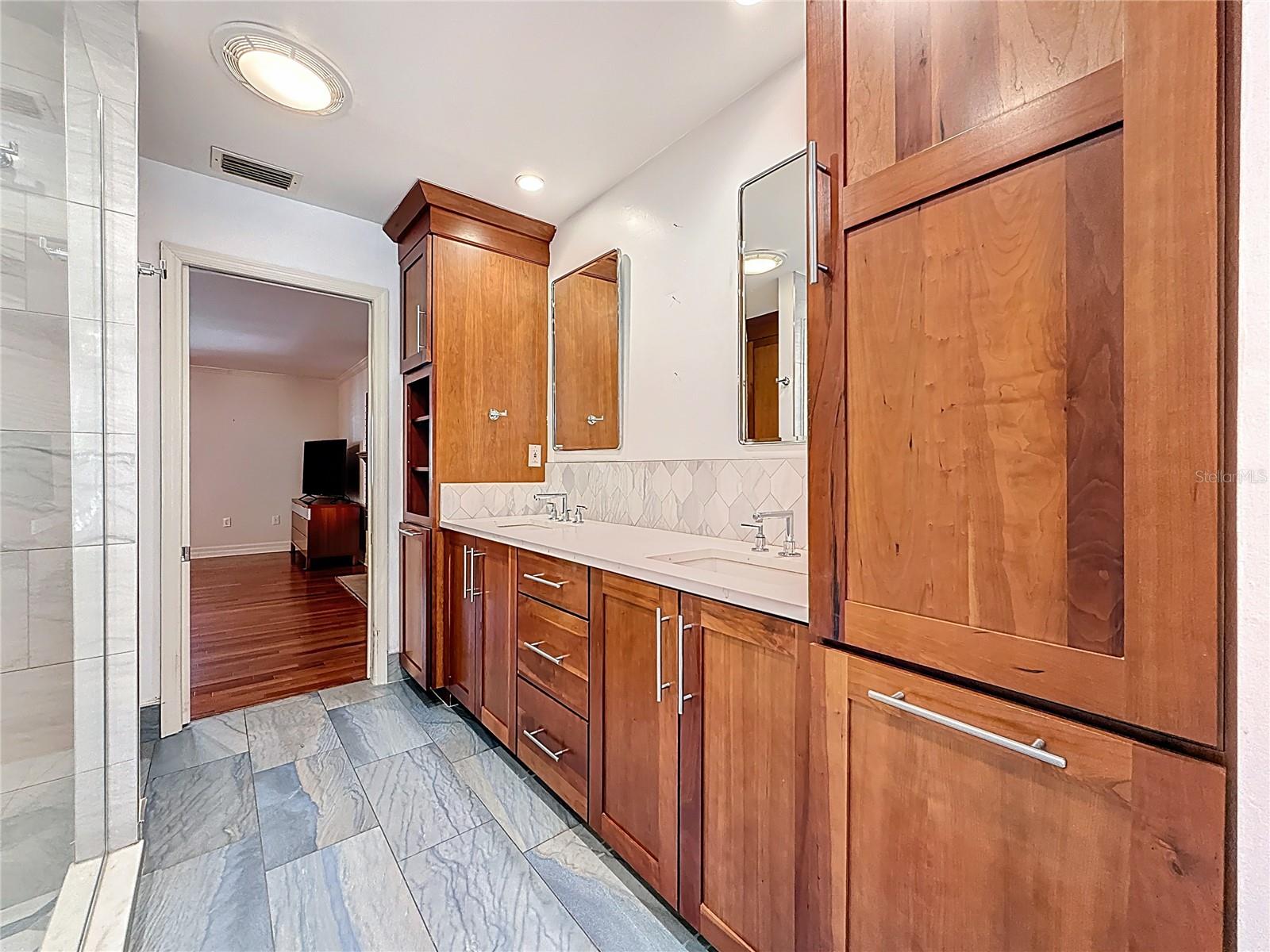 Vanity with dual sinks and custom storage towers